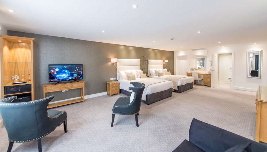 Barnstaple Hotel Taw Suite Accommodation Bed Television and Seating