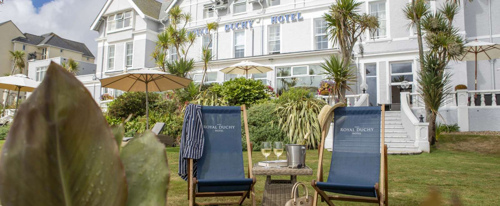 Royal Duchy Hotel External View with Deck Chairs and Wine