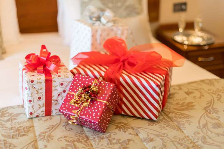 Belmont Hotel Christmas Presents on Bed