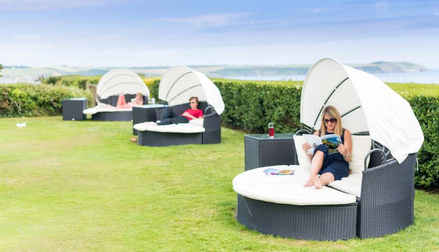 Carlyon Bay Hotel Guests Enjoying Covered Outdoor Seating Area