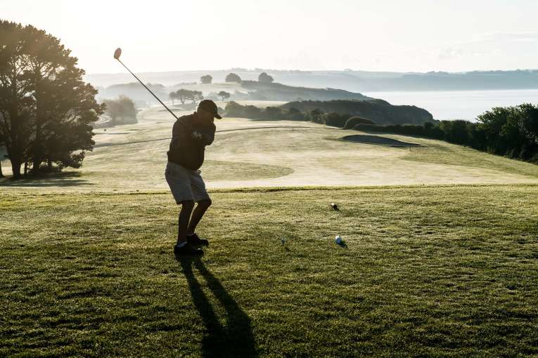 Carlyon Bay Hotel Golfer Teeing Off on Golf Course