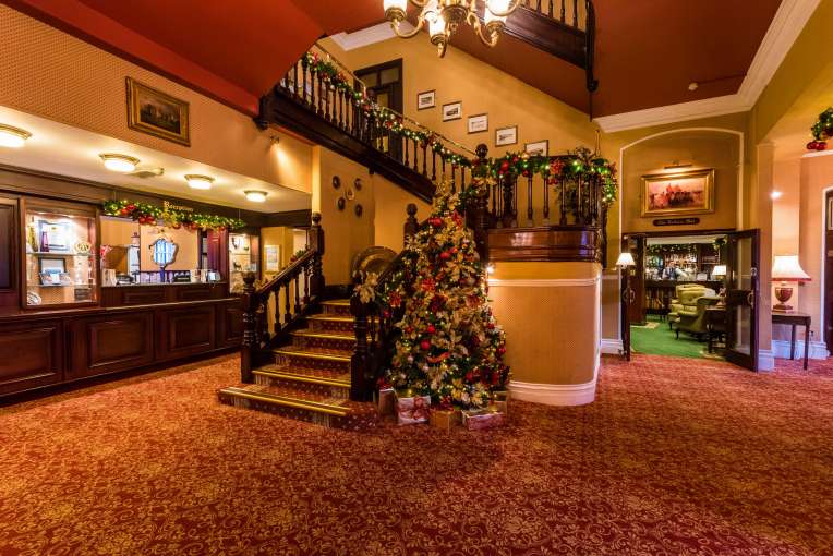 Imperial Hotel Foyer Staircase Decorated for Christmas