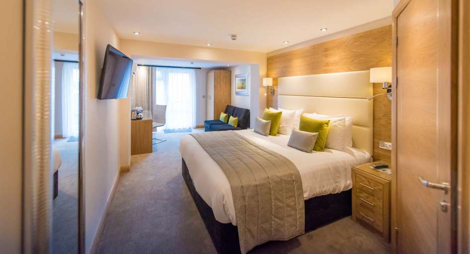 Park Hotel Accommodation Bedroom with Seating and Desk