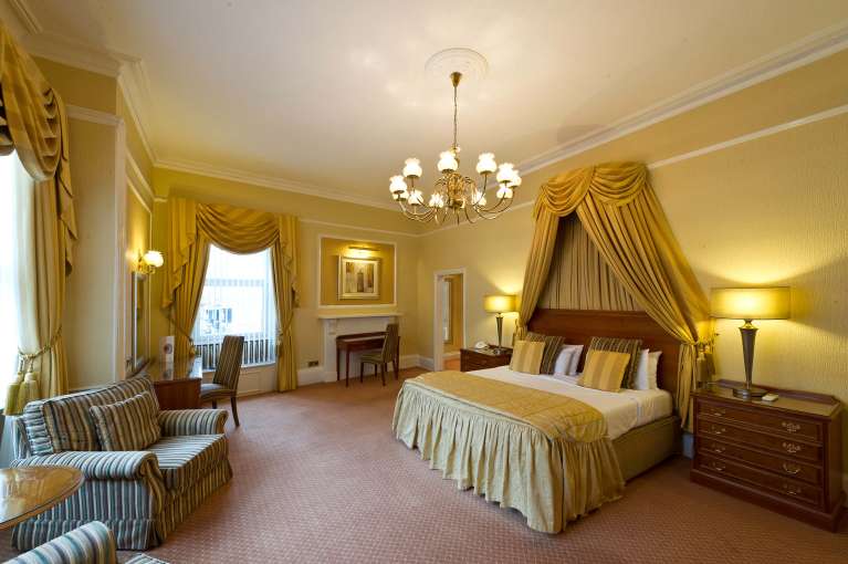 Royal and Fortescue Hotel Accommodation Bedroom with Seating Area and Desk
