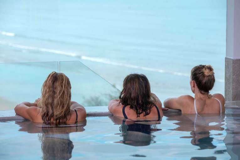 Saunton Sands Hotel Source Spa Guests Looking out of Window from Vitality Pool Hot Tub