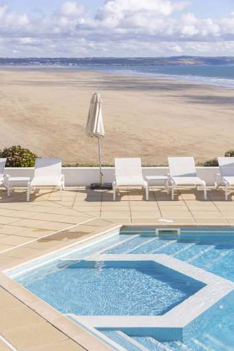 Saunton Sands Hotel Outdoor Pool with Sun Loungers and View over Saunton Beach