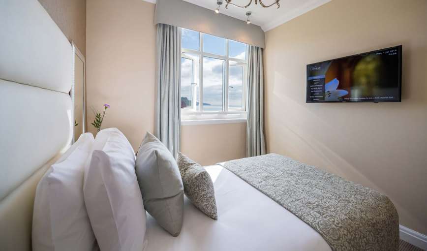 Victoria Hotel Accommodation (304) Bedroom and View of Beach