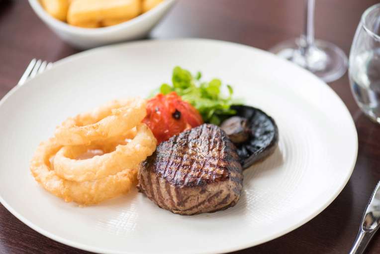 Victoria Hotel Restaurant Dining Steak with Onion Rings