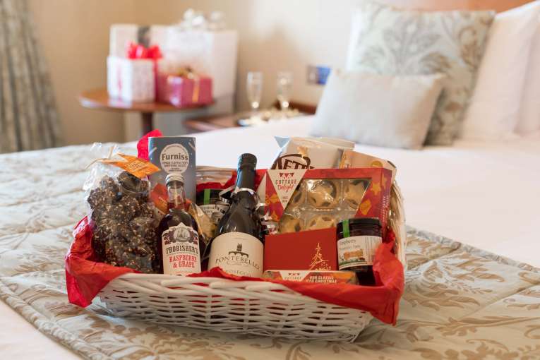 Victoria Hotel Christmas Hamper on Bed in Room