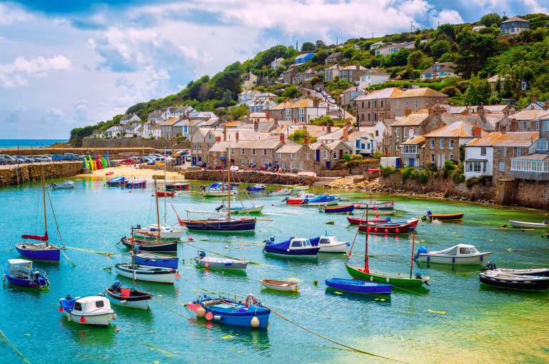 Boats in Mousehole Harbour Cornwall