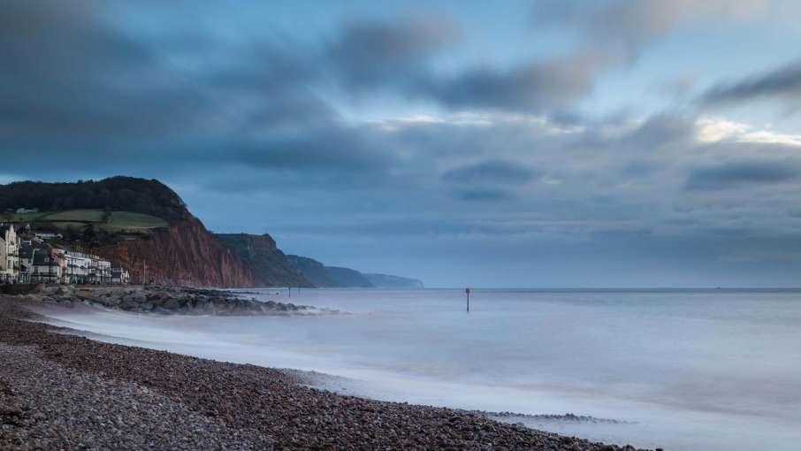 Stormy Winter Seafront and Pebble Beach at Sidmouth South Devon