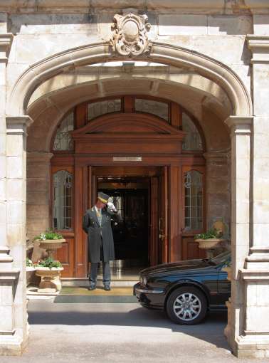 Victoria Hotel Doorman Greeting Arriving Car