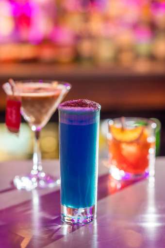 Bar 62 cocktails on bar blue in middle 