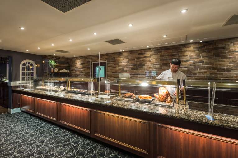 Devon Hotel carriages bar and brasserie carvery with chef