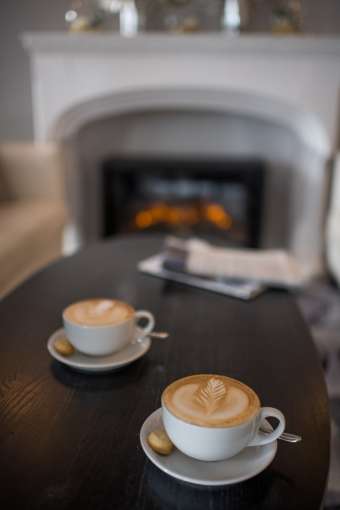 Carlyon bay terrace lounge coffees newspaper and fire 