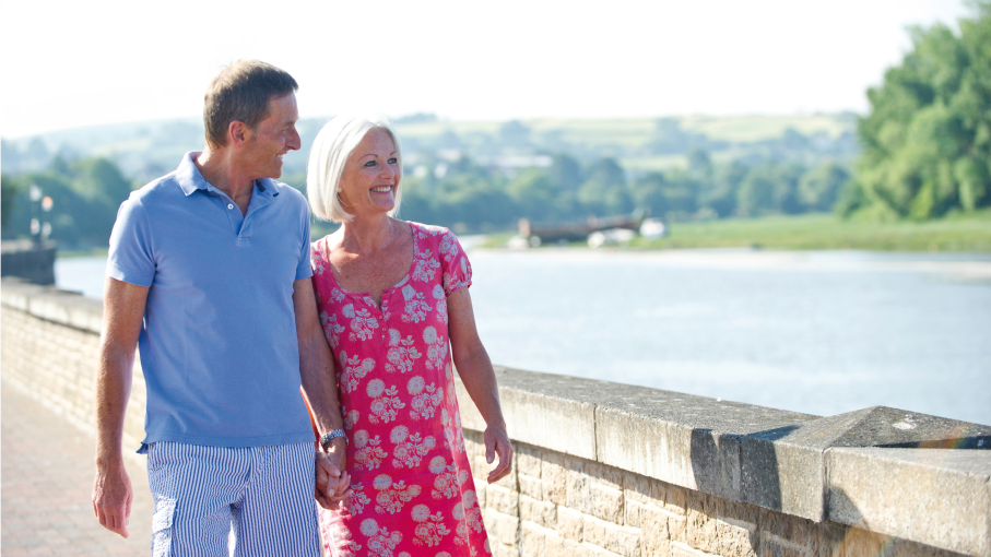 Couple walking along the River Taw in Barnstaple 