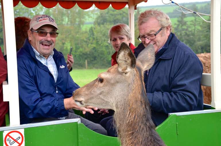 People with deer at World of Country Life