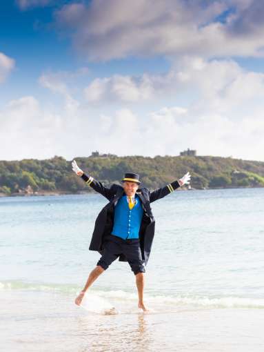 James jumping on the beach