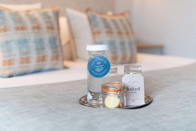 Water & Shortbread on the bed at The Royal Duchy Hotel
