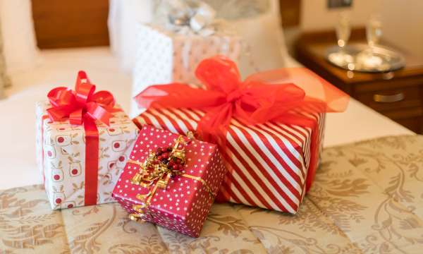 Belmont Hotel Christmas Presents on Bed
