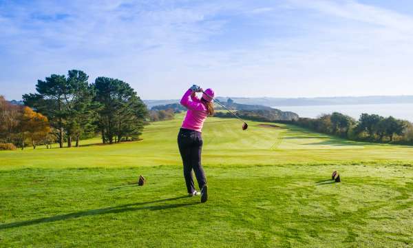 Carlyon Bay Hotel Golfer Playing on Golf Course Overlooking the Sea