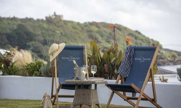 Royal Duchy Hotel View to Pendennis with Deck Chairs and Wine