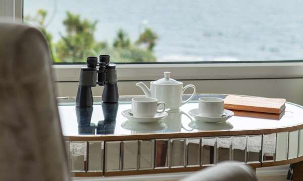 Royal Duchy Hotel Armada Room with Sea View and Tea Pot on Table with Binoculars