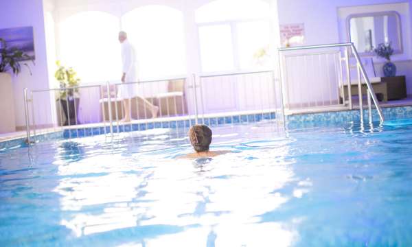 Royal Duchy Hotel Guest Swimming in Indoor Pool