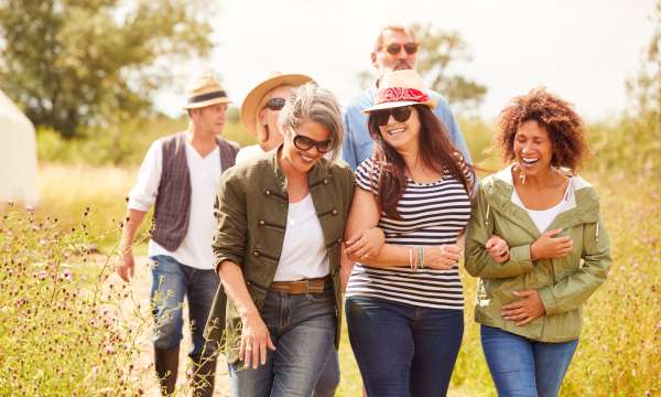 A happy group of friends on a walk in the countryside