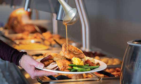 Devon Hotel carriages bar and brasserie pouring gravy