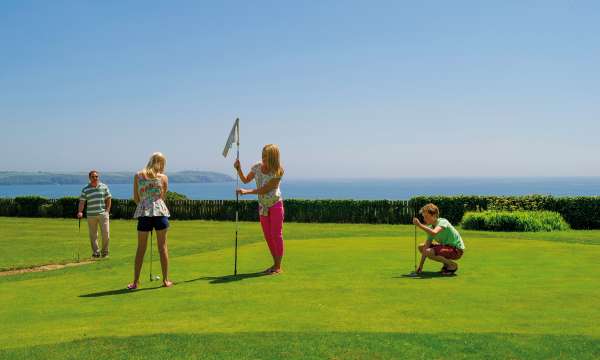 Family playing pitt and putt at Carlyon Bay Hotel