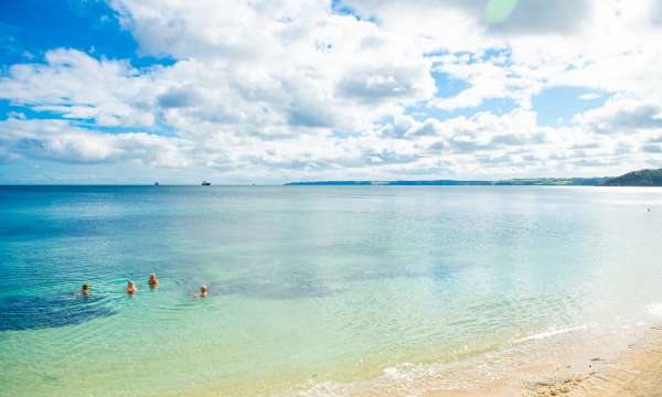 4-swimmers-in-castle-bay-falmouth