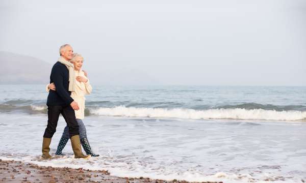 Couple walking on the beach