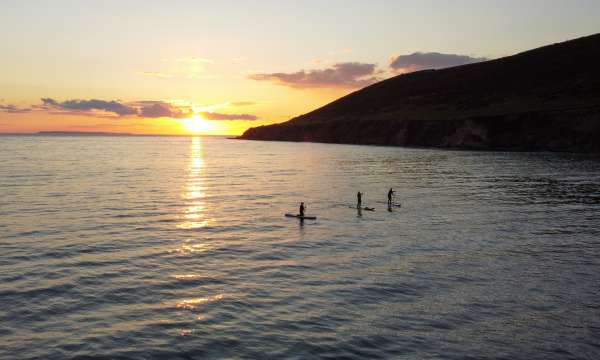 Paddle boarders on Saunton Sands beach