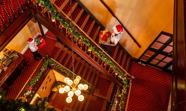 Aerial View of Imperial Staff Carrying Presents at Staircase