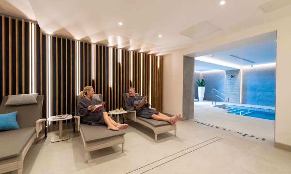 Couple sitting in relaxation area 