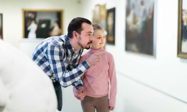 Father and daughter at museum