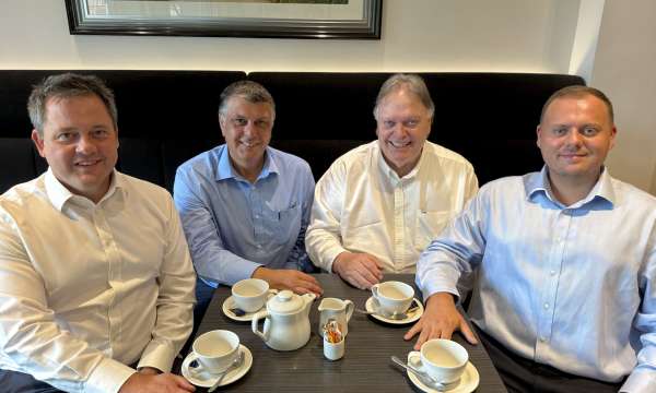 Brend Collection Directors at table