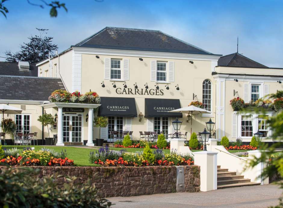 Devon Hotel Carriages Restaurant Exterior with Flowers