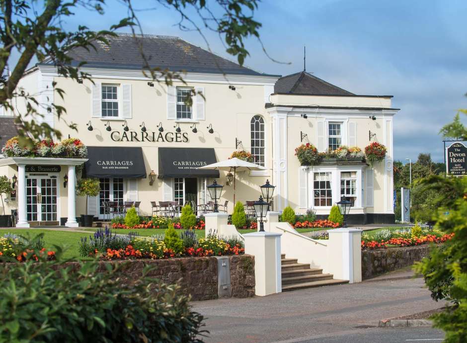 Devon Hotel Carriages Restaurant Exterior with Flowers