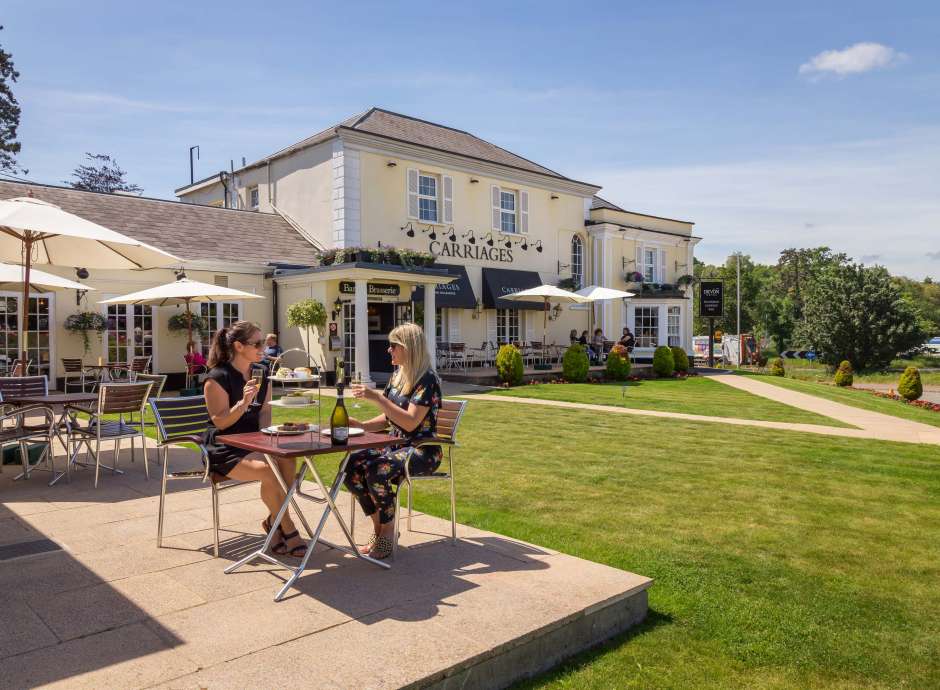 Devon Hotel Carriages Restaurant Guests Enjoying Afternoon Tea with Prosecco Outdoors on Lawn Terrace