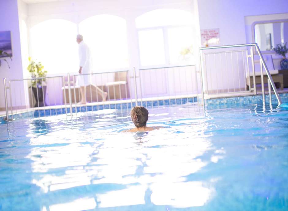 Royal Duchy Hotel Guest Swimming in Indoor Pool