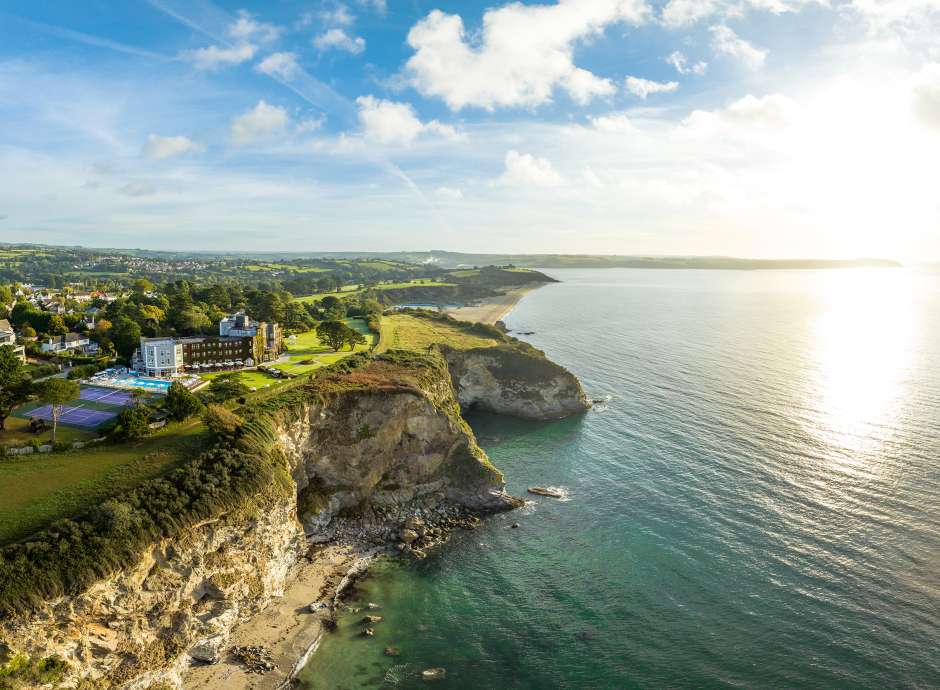 Carlyon bay hotel ariel view on cliff tops overlooking bay sunrise