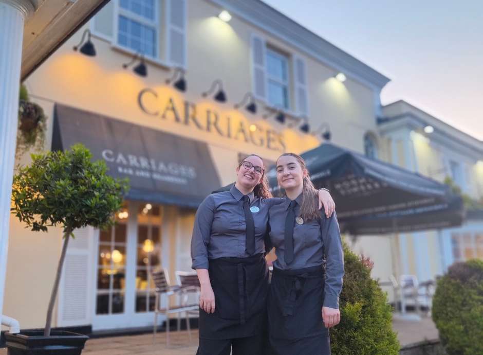 Staff outside the Devon Hotel